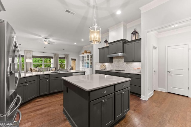 4815 Amble Trce, Cumming, GA 30040 - kitchen featuring stainless steel appliances, a ceiling fan, a kitchen island, a sink, and recessed lighting