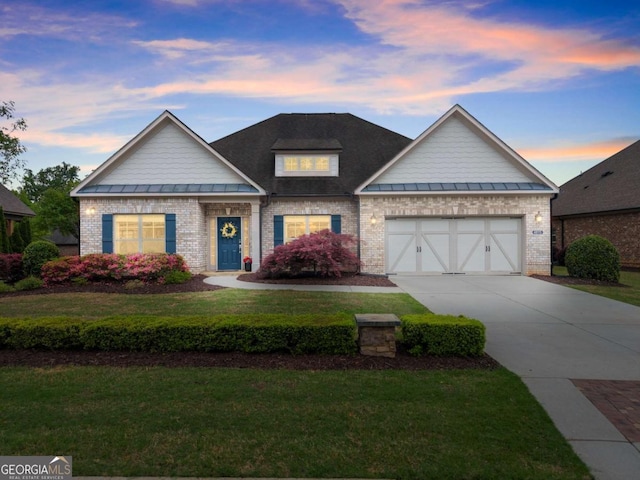 4815 Amble Trce, Cumming, GA 30040 - view of front of house featuring brick siding, an attached garage, concrete driveway, and a lawn