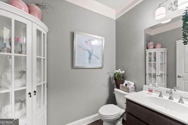 4815 Amble Trce, Cumming, GA 30040 - bathroom featuring ornamental molding, vanity, toilet, and baseboards