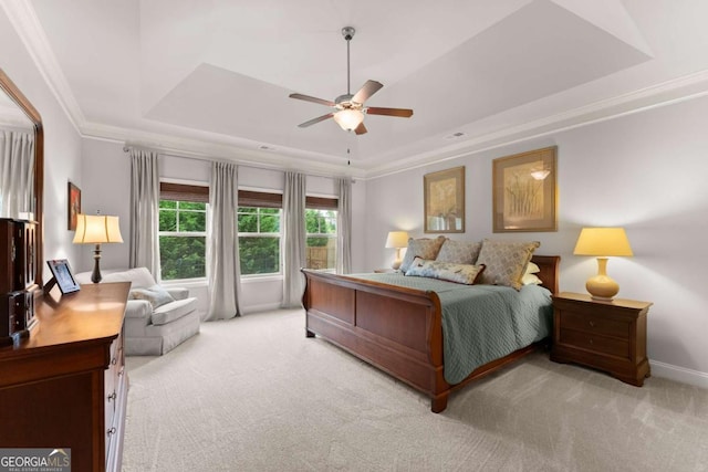 4815 Amble Trce, Cumming, GA 30040 - bedroom featuring a raised ceiling, light carpet, crown molding, a ceiling fan, and baseboards