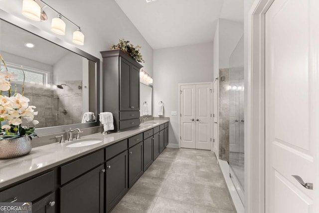 4815 Amble Trce, Cumming, GA 30040 - bathroom featuring a stall shower, double vanity, and tile patterned flooring