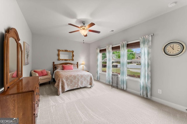 4815 Amble Trce, Cumming, GA 30040 - bedroom with light carpet, ceiling fan, and baseboards