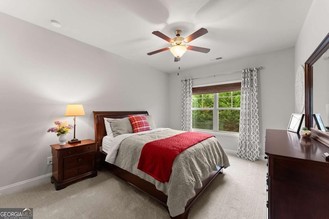 4815 Amble Trce, Cumming, GA 30040 - bedroom with light colored carpet, ceiling fan, and baseboards