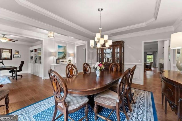 4815 Amble Trce, Cumming, GA 30040 - dining space featuring a chandelier, wood finished floors, ceiling fan, crown molding, and a desk