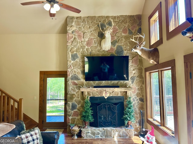 54 Lodge Ground Ln, Hawkinsville, GA 31036 - living area featuring a fireplace, plenty of natural light, stairs, and ceiling fan