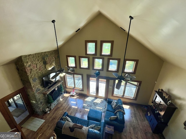 54 Lodge Ground Ln, Hawkinsville, GA 31036 - living area featuring high vaulted ceiling, a ceiling fan, and wood finished floors