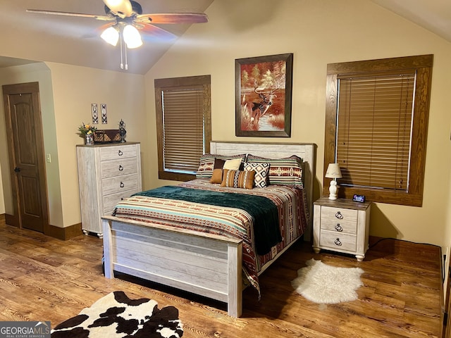 54 Lodge Ground Ln, Hawkinsville, GA 31036 - bedroom featuring ceiling fan, lofted ceiling, wood finished floors, and baseboards