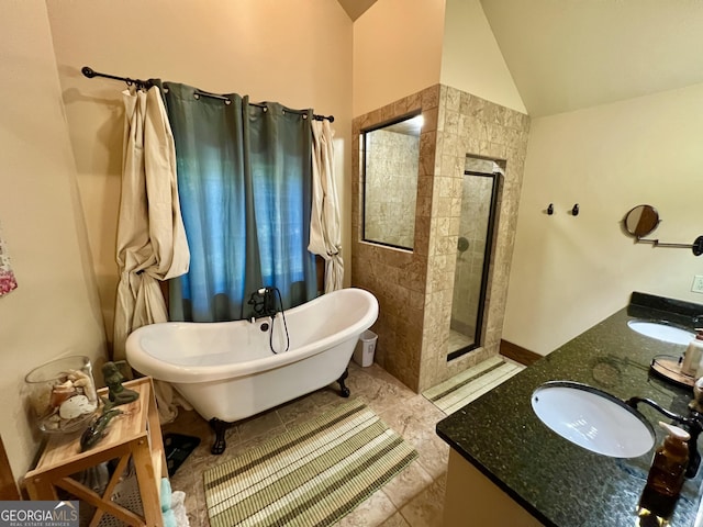 54 Lodge Ground Ln, Hawkinsville, GA 31036 - bathroom featuring double vanity, a sink, a shower stall, and a freestanding bath