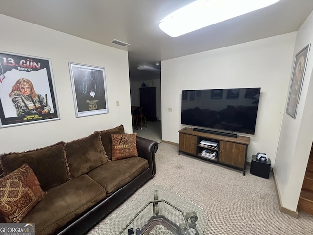 54 Lodge Ground Ln, Hawkinsville, GA 31036 - living area with visible vents, carpet flooring, and baseboards