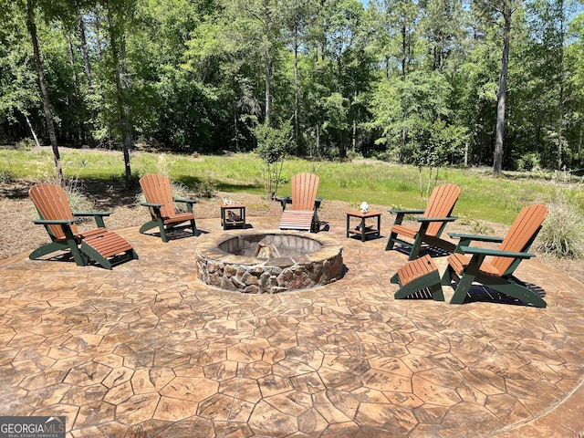 54 Lodge Ground Ln, Hawkinsville, GA 31036 - view of patio / terrace with a fire pit