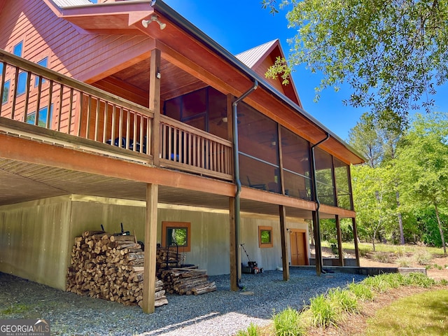 54 Lodge Ground Ln, Hawkinsville, GA 31036 - view of property exterior featuring a sunroom and metal roof