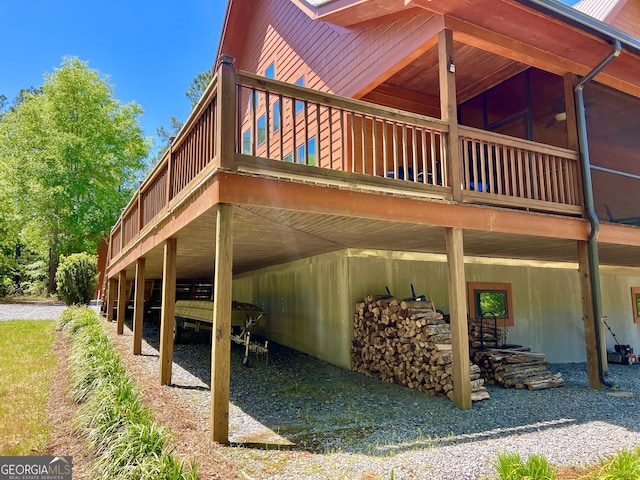 54 Lodge Ground Ln, Hawkinsville, GA 31036 - view of home's exterior featuring a carport and a deck