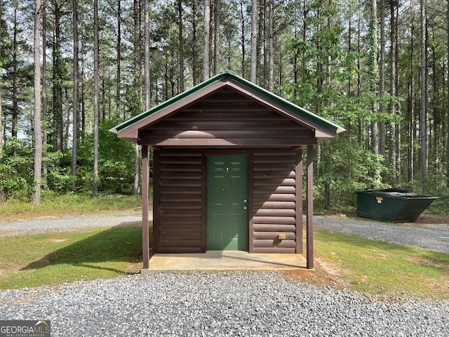 54 Lodge Ground Ln, Hawkinsville, GA 31036 - view of shed featuring a forest view