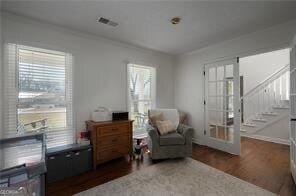 515 Walraven Rd NE, Calhoun, GA 30701 - sitting room with stairway, wood finished floors, and visible vents