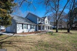 515 Walraven Rd NE, Calhoun, GA 30701 - view of front facade with a front lawn