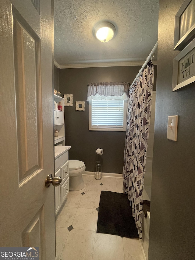 full bathroom with a textured ceiling, vanity, curtained shower, toilet, and ornamental molding