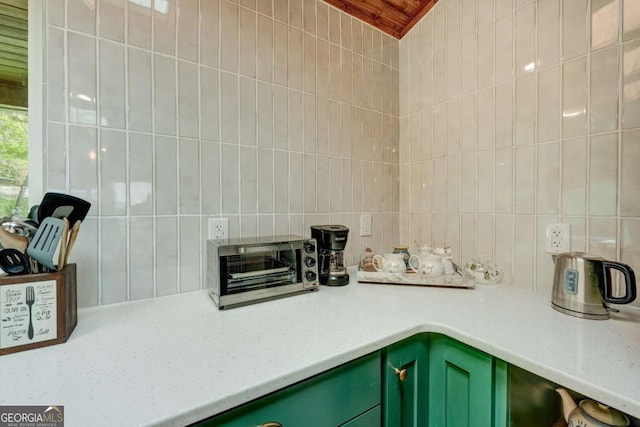 361 Rising Star Rd Unit 14, Ellijay, GA 30536 - kitchen with wood ceiling, tasteful backsplash, green cabinets, and light countertops