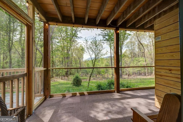 361 Rising Star Rd Unit 14, Ellijay, GA 30536 - unfurnished sunroom with carpet flooring and a wooded view