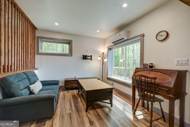 361 Rising Star Rd Unit 14, Ellijay, GA 30536 - living area with a wall mounted AC, healthy amount of natural light, wood finished floors, and recessed lighting