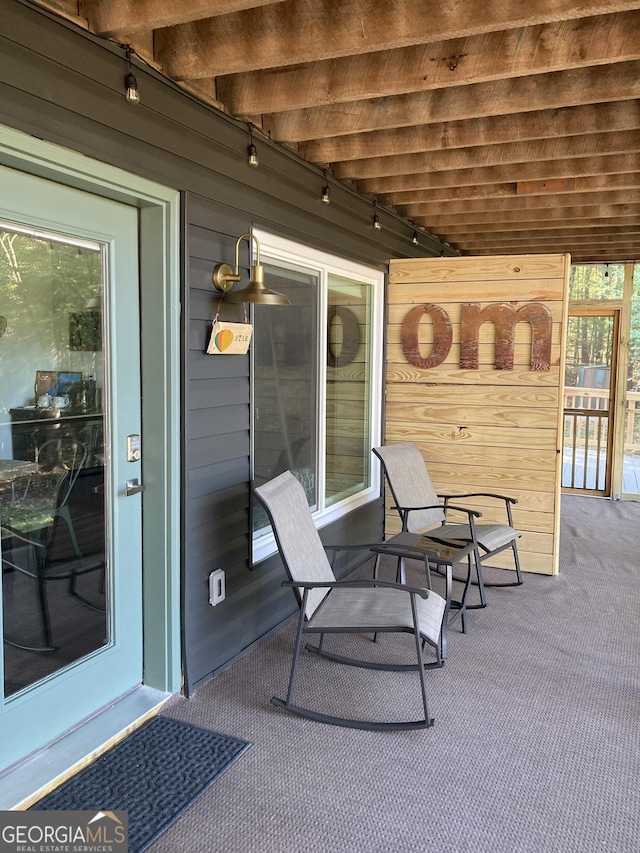 361 Rising Star Rd Unit 14, Ellijay, GA 30536 - back of property with a forest view and a sunroom