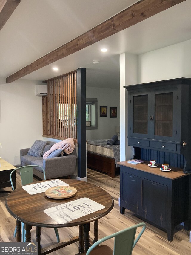 361 Rising Star Rd Unit 14, Ellijay, GA 30536 - living area with beam ceiling, a wall mounted air conditioner, light wood-style flooring, and recessed lighting