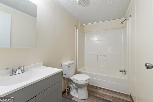 193 Pine Ridge Pl, Nicholson, GA 30565 - full bathroom with visible vents, wood finished floors, a textured ceiling, and toilet