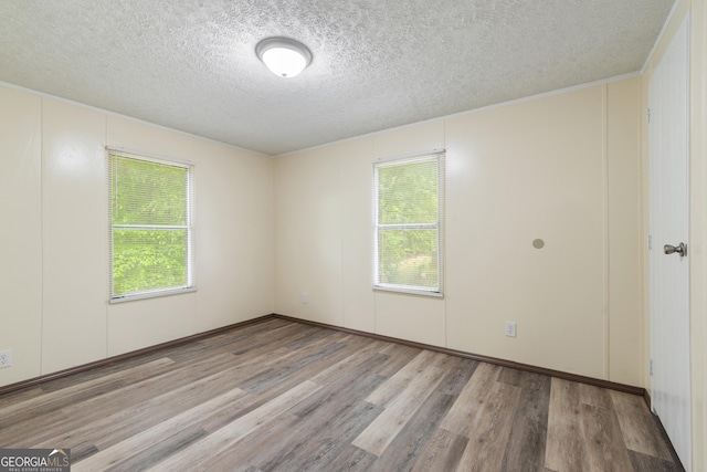 193 Pine Ridge Pl, Nicholson, GA 30565 - unfurnished room with wood finished floors and a textured ceiling