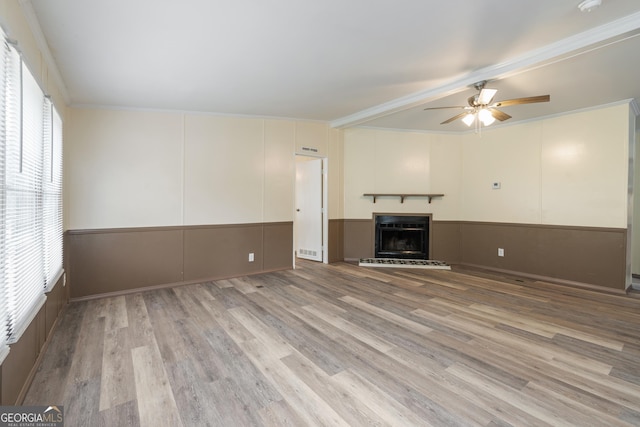 193 Pine Ridge Pl, Nicholson, GA 30565 - unfurnished living room featuring visible vents, a ceiling fan, wood finished floors, and a fireplace with raised hearth