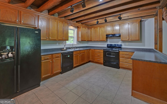 500 Old Mize Rd, Toccoa, GA 30577 - kitchen with black appliances, under cabinet range hood, rail lighting, and dark countertops
