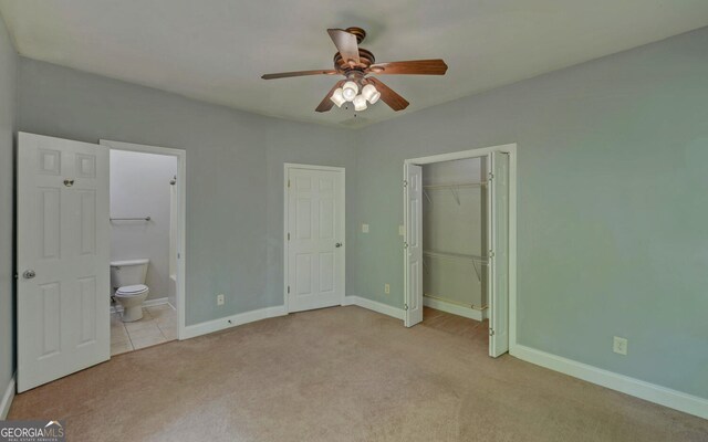 500 Old Mize Rd, Toccoa, GA 30577 - unfurnished bedroom featuring a closet, baseboards, carpet flooring, ceiling fan, and ensuite bathroom