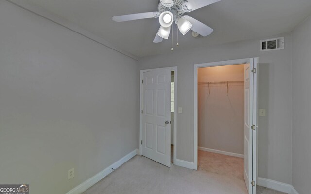 500 Old Mize Rd, Toccoa, GA 30577 - unfurnished bedroom featuring light carpet, baseboards, visible vents, a spacious closet, and a closet