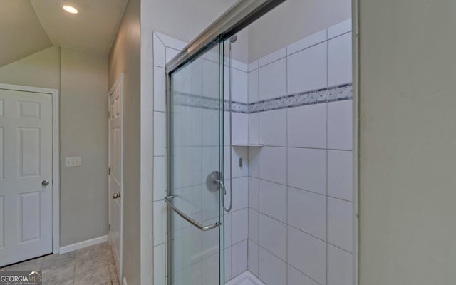 500 Old Mize Rd, Toccoa, GA 30577 - bathroom featuring recessed lighting, baseboards, lofted ceiling, and a stall shower