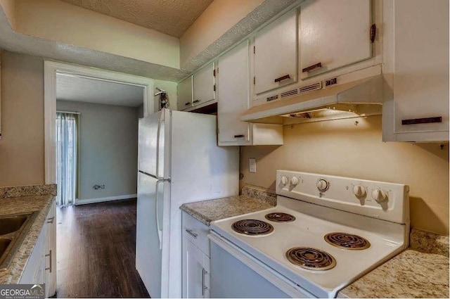 6593 Sleepy Hollow Ln, Morrow, GA 30260 - kitchen with white cabinets, white appliances, light countertops, under cabinet range hood, and dark wood-type flooring