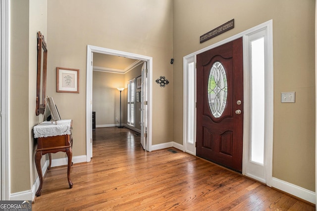 629 Gold Valley Pass, Canton, GA 30114 - entryway featuring baseboards, light wood finished floors, and a towering ceiling