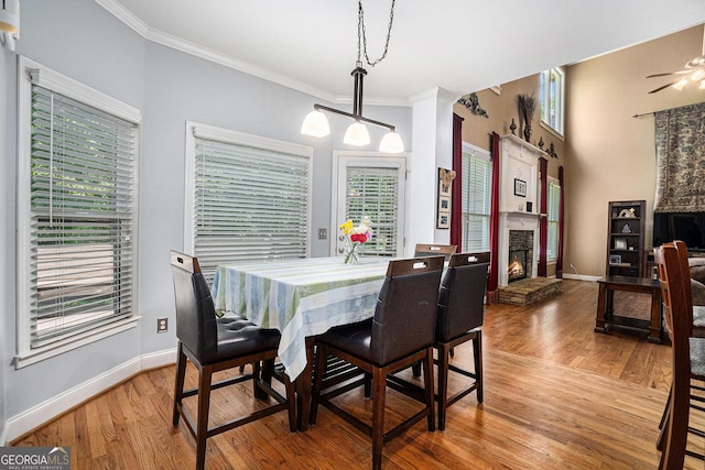 629 Gold Valley Pass, Canton, GA 30114 - dining area with crown molding, baseboards, and wood finished floors
