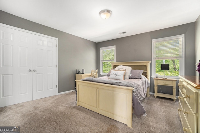 629 Gold Valley Pass, Canton, GA 30114 - bedroom with visible vents, baseboards, carpet floors, and a closet