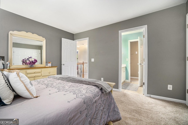 629 Gold Valley Pass, Canton, GA 30114 - bedroom featuring connected bathroom, baseboards, and carpet