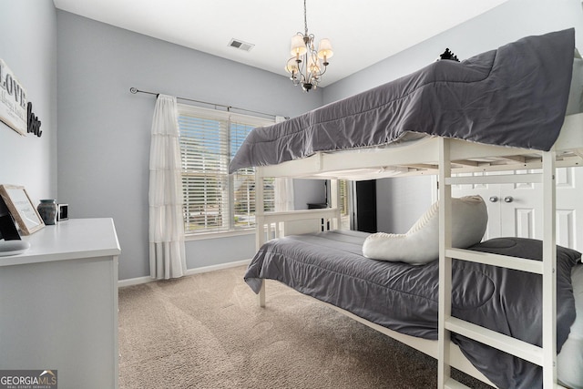 629 Gold Valley Pass, Canton, GA 30114 - bedroom with carpet flooring, a chandelier, baseboards, and visible vents