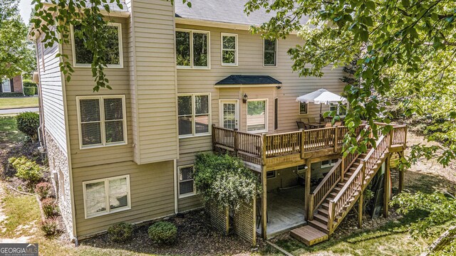 629 Gold Valley Pass, Canton, GA 30114 - back of property with a wooden deck and stairs