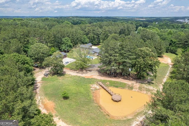 drone / aerial view of a heavily wooded area