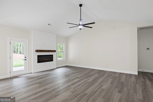 130 Rudders Xing, Newnan, GA 30263 - unfurnished living room featuring a fireplace, visible vents, a wealth of natural light, and ceiling fan
