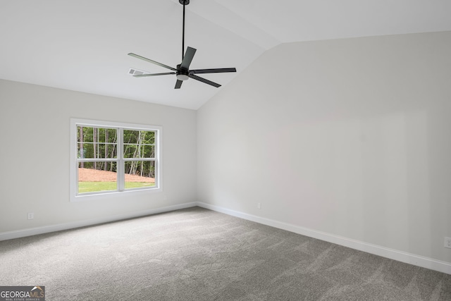 130 Rudders Xing, Newnan, GA 30263 - empty room with vaulted ceiling, carpet flooring, a ceiling fan, and baseboards