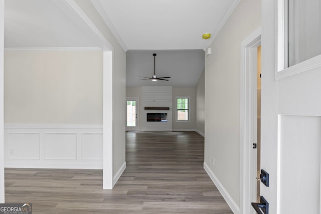 130 Rudders Xing, Newnan, GA 30263 - hall featuring vaulted ceiling, ornamental molding, wood finished floors, and baseboards