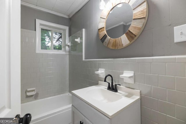 451 Woodlawn Dr, Crawford, GA 30630 - bathroom with tile walls, vanity, washtub / shower combination, and crown molding
