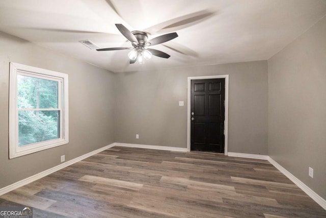 451 Woodlawn Dr, Crawford, GA 30630 - unfurnished room with wood finished floors, baseboards, a ceiling fan, and visible vents