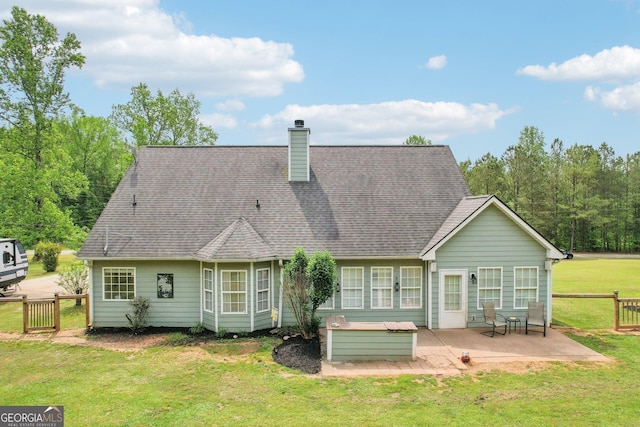 122 Eagle View Dr, Monticello, GA 31064 - back of property with a patio, a chimney, and roof with shingles