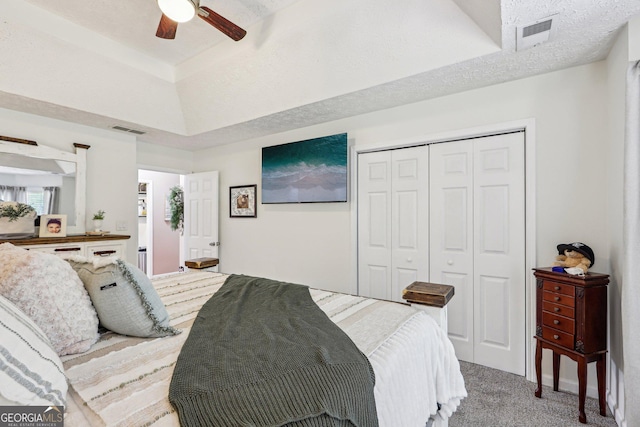 122 Eagle View Dr, Monticello, GA 31064 - bedroom with a tray ceiling, carpet flooring, a closet, and ceiling fan