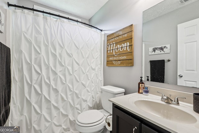122 Eagle View Dr, Monticello, GA 31064 - full bath with vanity, toilet, a textured ceiling, and a shower with curtain