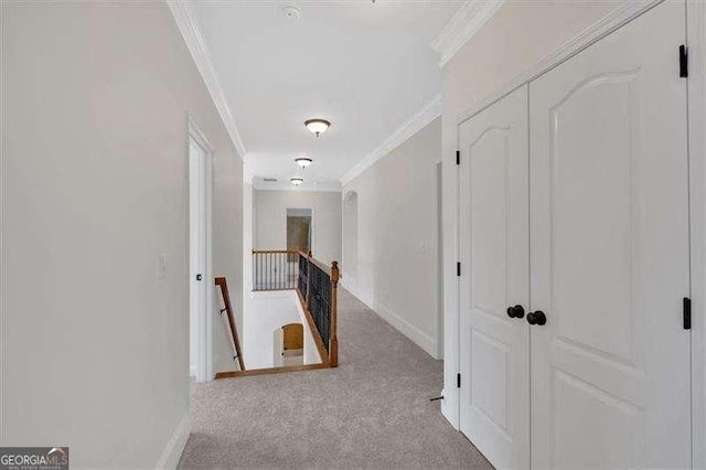 bedroom with ceiling fan, a raised ceiling, crown molding, visible vents, and light colored carpet