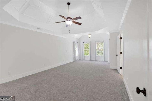 interior space featuring ceiling fan, built in features, crown molding, visible vents, and baseboards